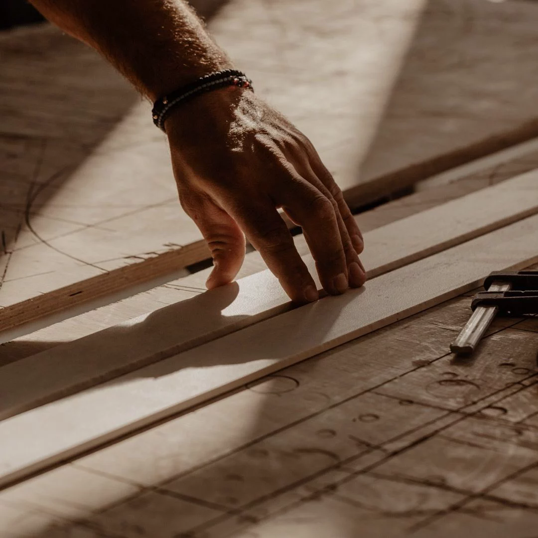 AFICON tradesperson measuring and marking out timber